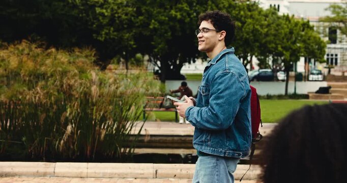 Phone, thinking and walking with man on university campus for education or learning scholarship. App, communication and social media with college student outdoor for development, future or study