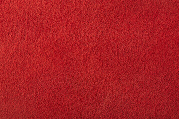 Red suede for the background. Texture of natural red suede