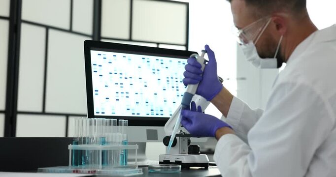 Research in genetics. Scientist working with sample at table in laboratory