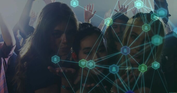 Posing six friends sharing digital overlay under stage lights in dimly lit club, neon icons theme - Powered by Adobe