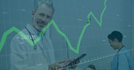Analyzing tablet data, white male doctor with stethoscope in ward, green chart overlay, copy space