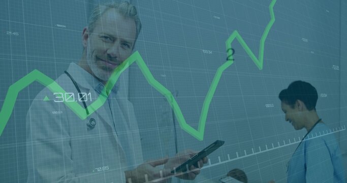 Analyzing tablet data, white male doctor with stethoscope in ward, green chart overlay, copy space - Powered by Adobe