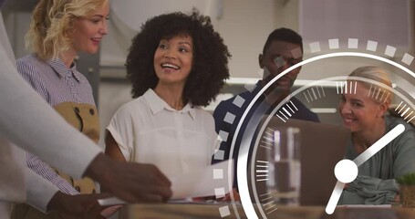 Business team reviewing docs on laptop while watching clock graphic rotating tracking project time - Powered by Adobe