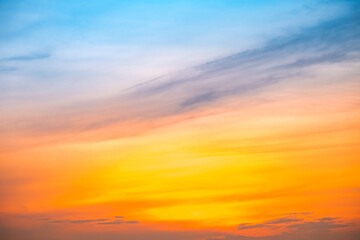 Beautiful , luxury soft gradient orange gold clouds and sunlight on the blue sky perfect for the background, take in evening,Twilight, Large size, high definition landscape photo