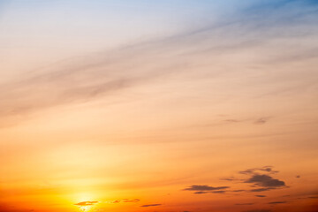 Beautiful , luxury soft gradient orange gold clouds and sunlight on the blue sky perfect for the background, take in evening,Twilight, Large size, high definition landscape photo