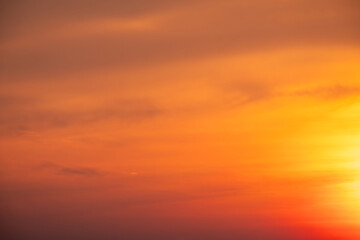 Fototapeta premium Beautiful , luxury soft gradient orange gold clouds and sunlight on the blue sky perfect for the background, take in evening,Twilight, Large size, high definition landscape photo