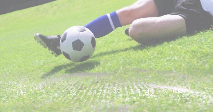 After ball rolls soccer player sliding tackle intercepting with floating arrow for sports analytics