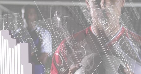 Male athlete rotating soccer ball, wireframes appearing around him, visualizing sports analytics - Powered by Adobe