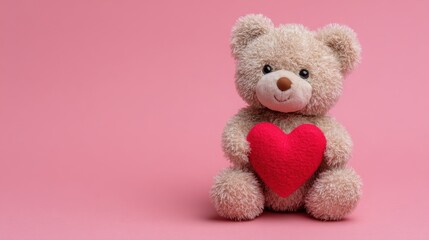Cute teddy bear holding red heart on pink background, soft toy symbol of love and affection for Valentine&rsquo;s Day concept.