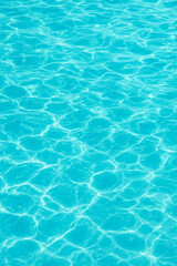 Fototapeta premium Aqua Clarity – Bright Turquoise Water Surface with Sunlight Patterns