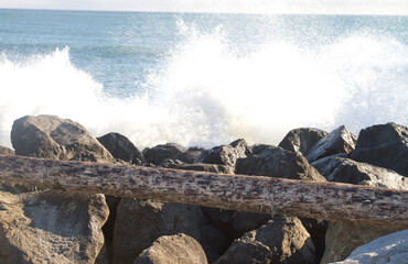 Wave Dashing the Rocks