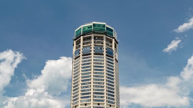 sunny day blue sky george town city center famous tower skyscraper exterior up view 4k timelapse penang malaysia