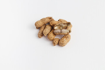 Fresh raw peanuts with open shell on white background isolated in white
