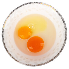 Duck egg yolk and chicken egg yolk together in one bowl on white background