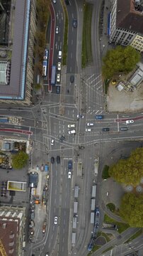 day time munich city center high traffic street square tram line topdown vertical panorama 4k timelapse germany