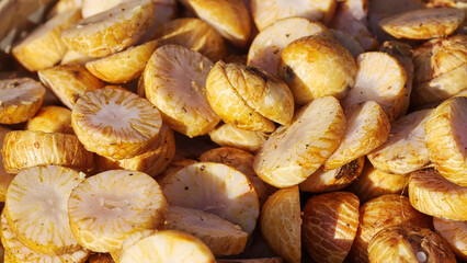 harvested fresh sliced betel or areca nut ready for sun drying, indonesia, southeast asia, closeup