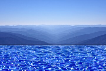 Infinity pool with distant mountain range