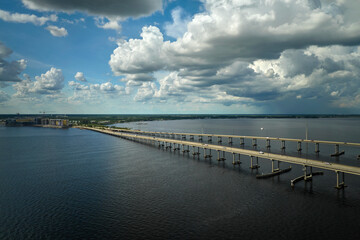 Barron Collier Bridge and Gilchrist Bridge in Florida with moving traffic. Transportation...