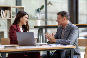 Business professionals discussing work at office meeting
