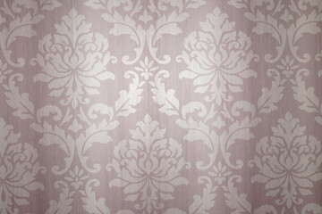 A close - up of a fabric with an elegant damask pattern in soft pink and white tones.