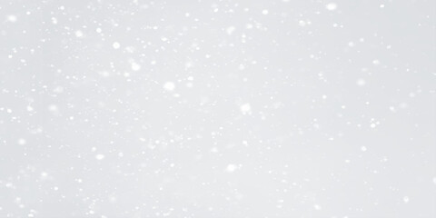 Realistic falling snow with snowflakes and clouds on blurred grey or white background, different realistic falling snow or snowflakes are dancing randomly on white background.