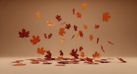 Autumn leaves falling in a studio setting with a brown background for seasonal designs