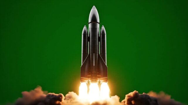 Rocket launching with bright flames against green screen background 
