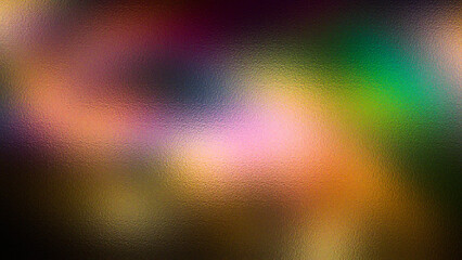 Abstract textured background with vibrant and soft color gradients of pink purple green and orange