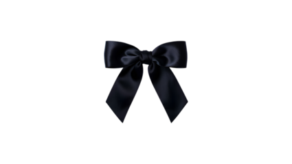 Elegant dark navy blue satin ribbon bow tied in a classic knot with flowing tails isolated on black
