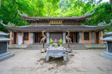 Temple at the Trang An Scenic Landscape Complex, Ninh Binh, Vietnam. Tam Coc National Park Sightseeing tour to grottoes.