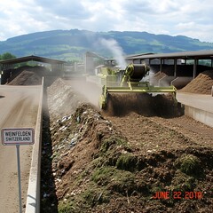 Compost Turner in Action - Transforming Waste into Valuable Fertilizer.