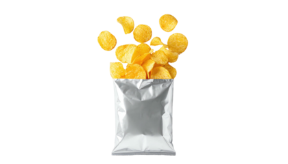 Golden crisps spill out of a metallic bag against a stark, black background