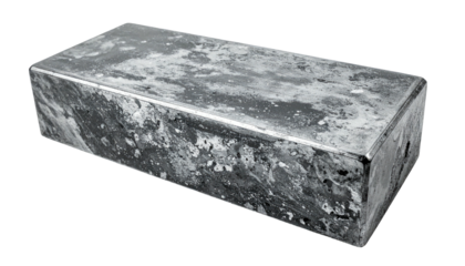 A rectangular metallic block with a weathered surface, edges slightly rounded