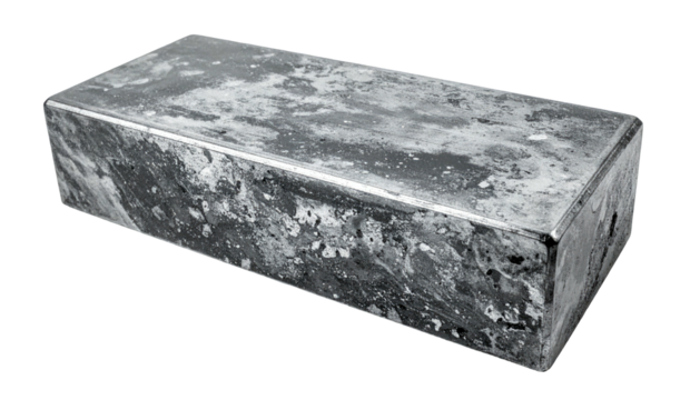 A rectangular metallic block with a weathered surface, edges slightly rounded