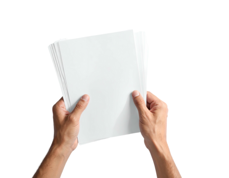 A pair of hands holding a stack of blank, rectangular white papers, top-down view