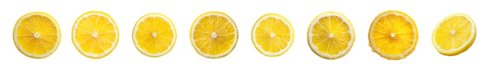 Row of fresh yellow lemons isolated on a white background.
