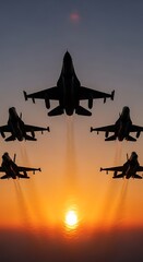 Silhouette of fighter jets flying in formation against a sunset sky.