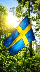 Image of the Swedish flag waving in a sunny forest setting
