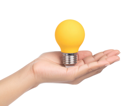 Hand cradling a glowing yellow lightbulb, symbolising ideas on a black background