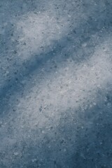 Obraz premium Polished natural stone surface with cool gray-blue tones and subtle reflective highlights, ideal for elegant, modern, and minimal backgrounds.