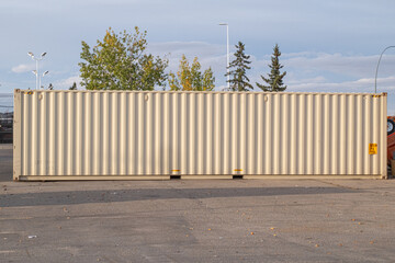 White 53 foot container in factory yard