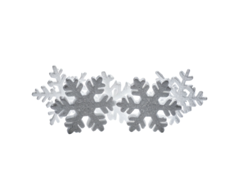 Several white, sparkly snowflakes arranged in a partial arch against a black backdrop