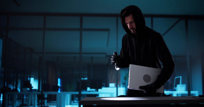 The Elderly Burglar Creeping Through The Office - Powered by Adobe