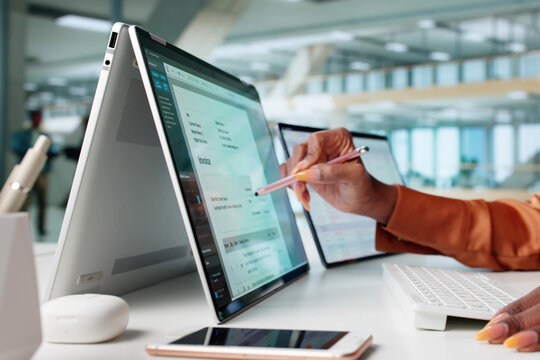 Businesswoman Managing Electronic Invoicing Using Accounting Software - Powered by Adobe
