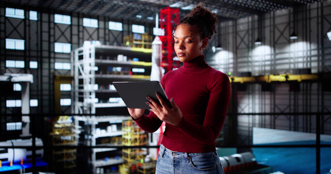 Young African American Woman Operating Computer System