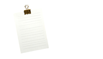 A lined paper held by a bulldog clip, against a black background