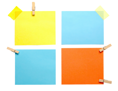 Four colorful square sticky notes held by clothespins and tape, arranged in a grid