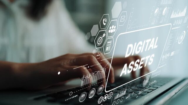Close-up View of Hands Typing on Laptop with Digital Assets Concepts and Graphics Overlay for Financial Technology. Asymptotic smart data analytic.