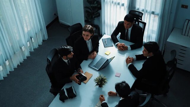 Top view of manager working on laptop and sending data analysis to business people by using VR glass headset while diverse team moving gesture while working together to planning idea. Directorate. - Powered by Adobe