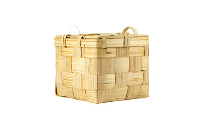 Small woven square basket with handle loops, set against a stark black background